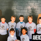 Angela Tucker (bottom right) posing with her basketball team at the Boys and Girls Club in 1993. She is the only girl and only black person on the team.